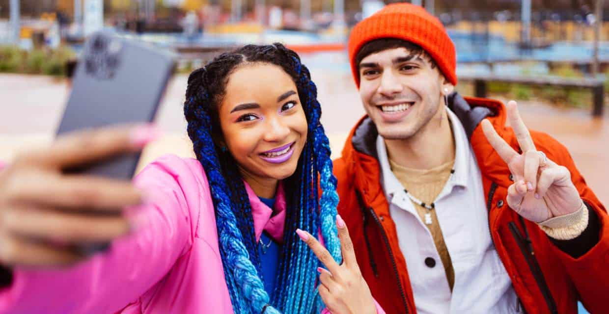 Photo of young people taking a selfie