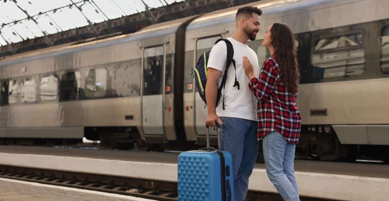 Couple saying goodbye at a train station