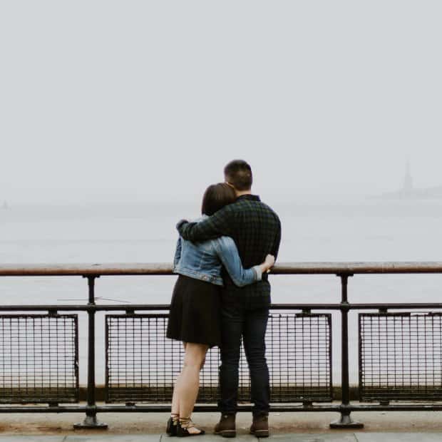 Insight Counseling Center couple from behind hugging looking out at fog