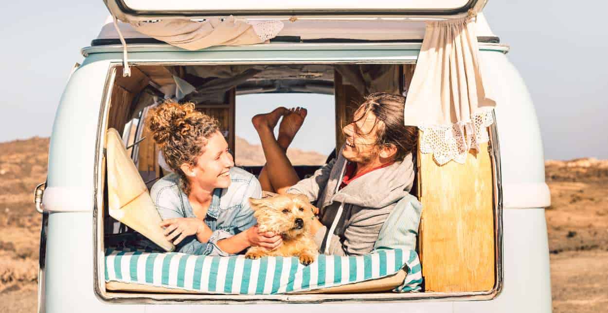 Couple and dog in a van