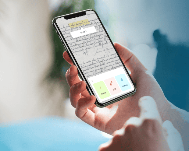 FamilySearch holding phone with ancestry info