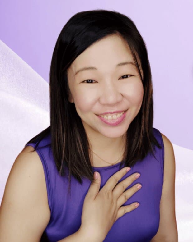 Dr. Martha Tara Lee headshot purple shirt