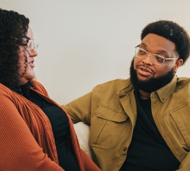 Couple With Glasses Talking