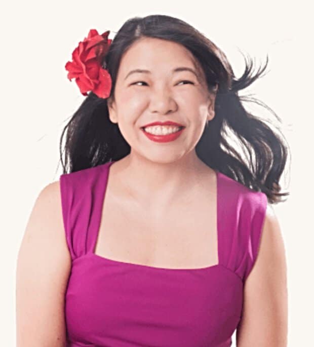 Dr. Martha Tara Lee headshot flower in hair