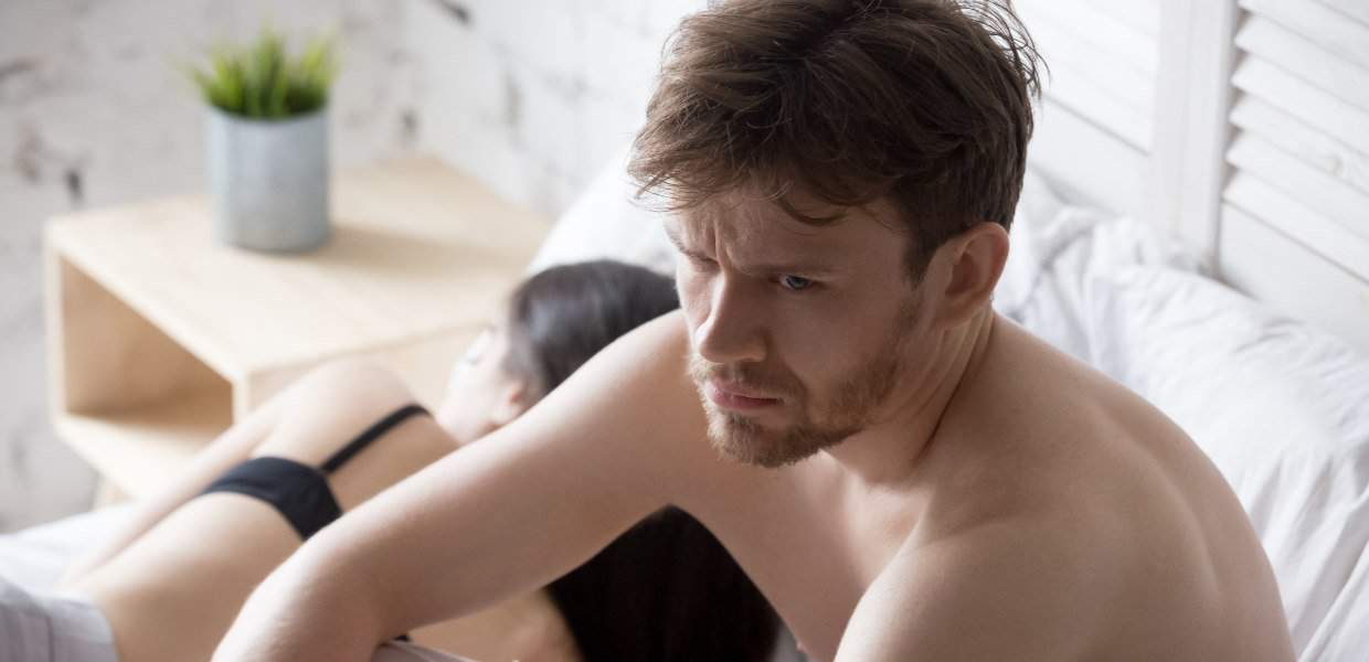 Photo of a man unhappy after sex