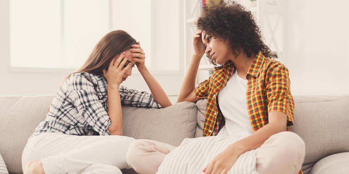 Photo of two women talking