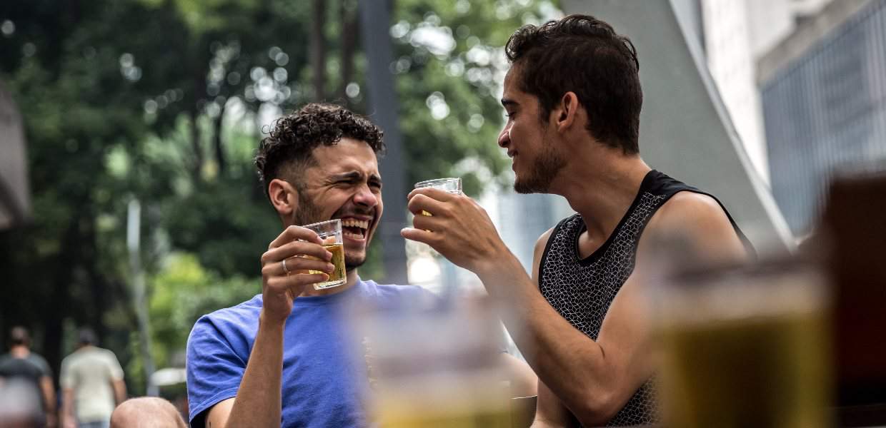 Photo of two gay men out drinking