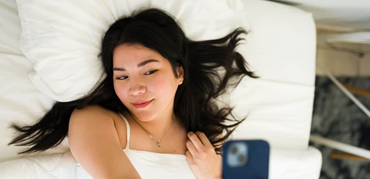 Photo of a woman taking a sexy photo